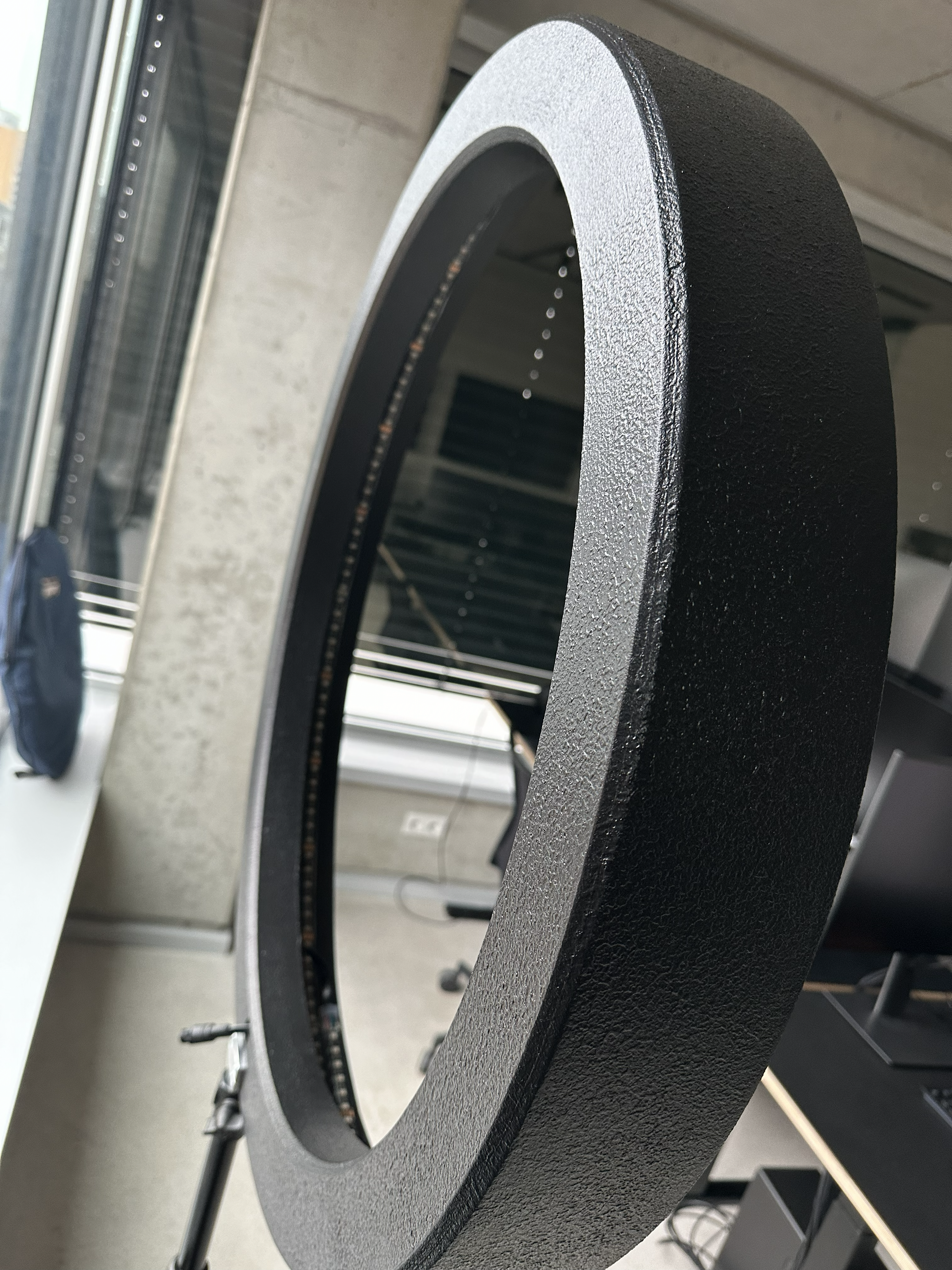DMX-controlled ring light in the studio, side view