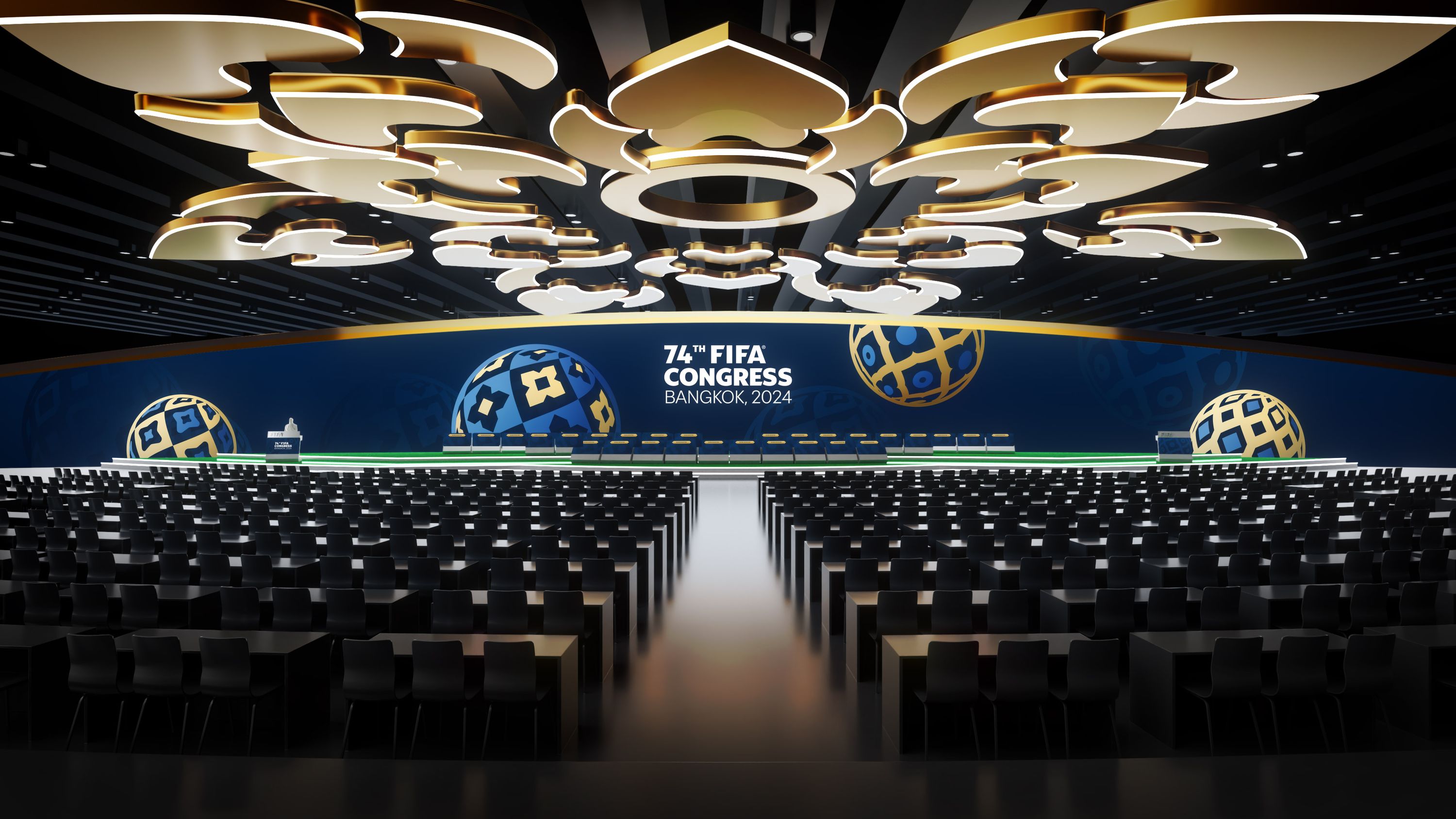 FIFA-Kongress 2024 in Bangkok: Kongresssaal unter der 70 Meter breiten LED-Wand mit goldenen 3D-Formen