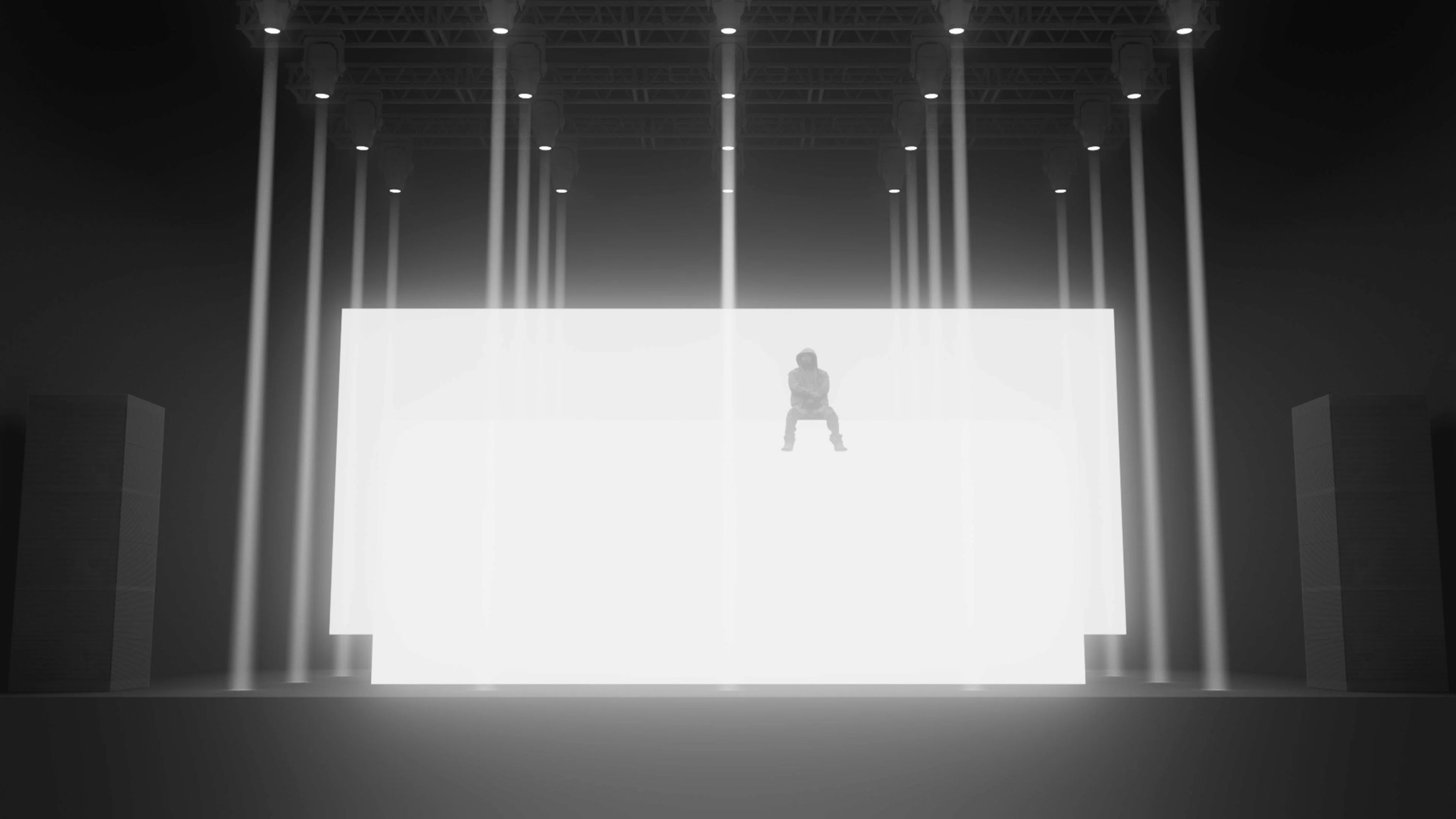 Trettmann tour: silhouette in front of the white LED wall framed by light columns