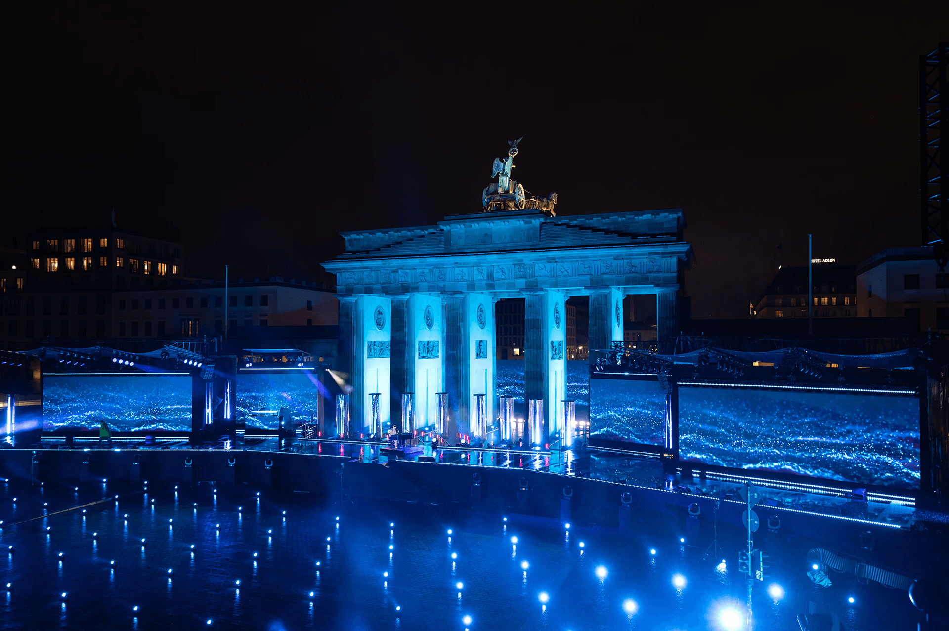 Brandenburg Gate in blue light during the New Year's Eve broadcast
