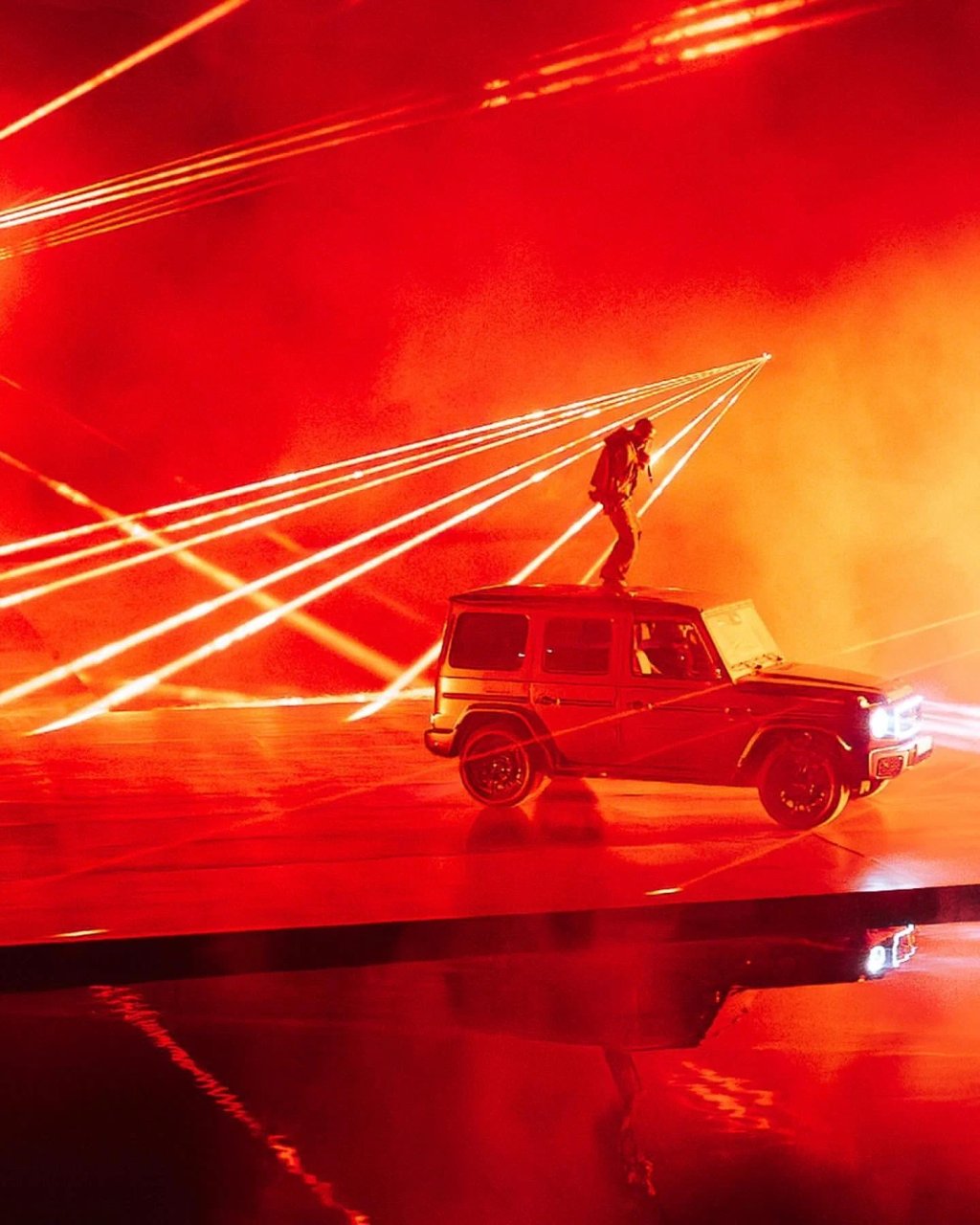 Red laser beams above the Mercedes-Benz G 580 at the Travis Scott launch event