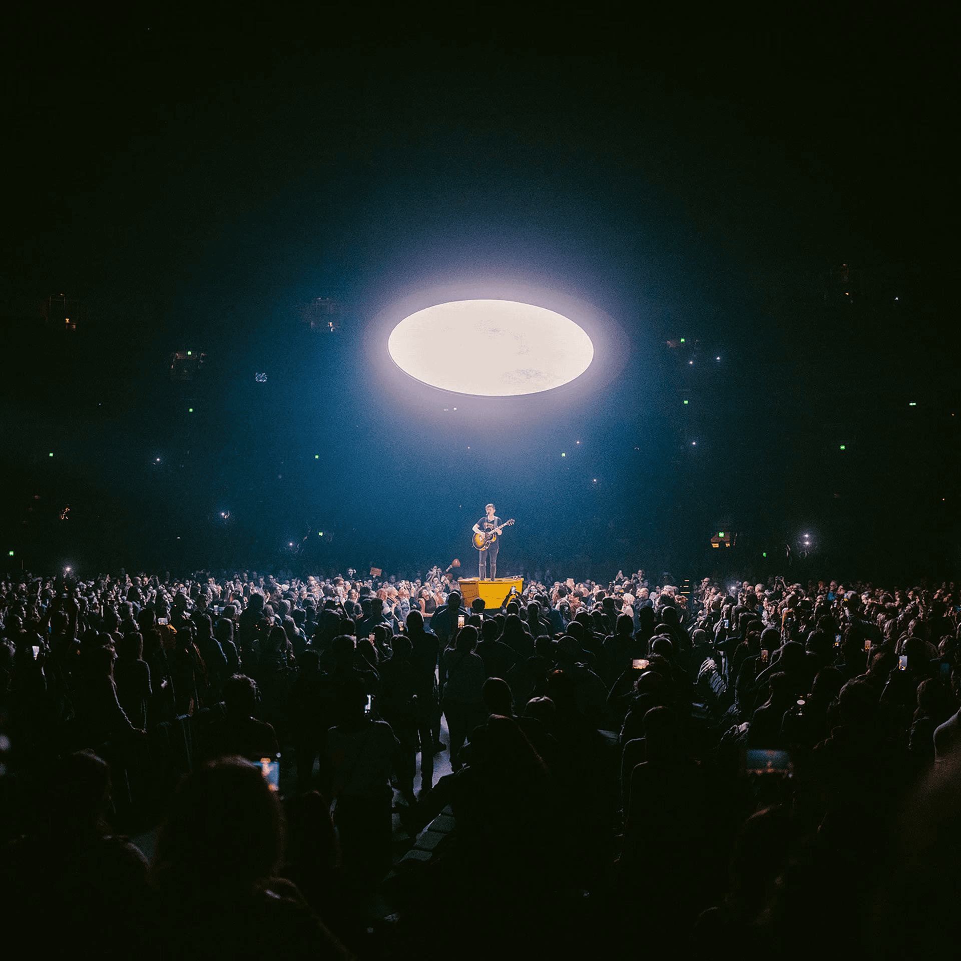 Michael Patrick Kelly concert: glowing disc floating above the arena crowd