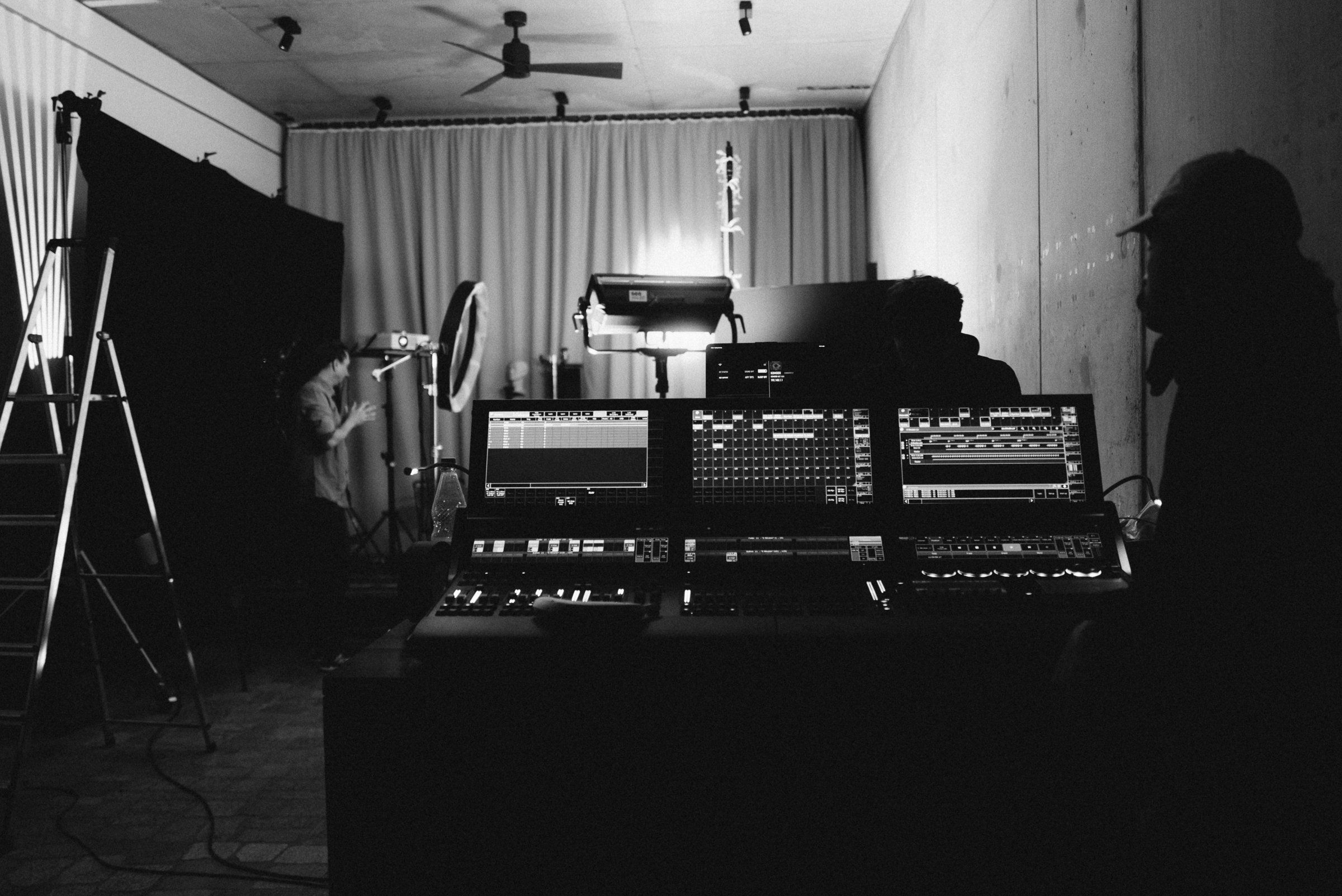 Studio set-up with lighting console, backdrop and stands for the Trettmann shoot